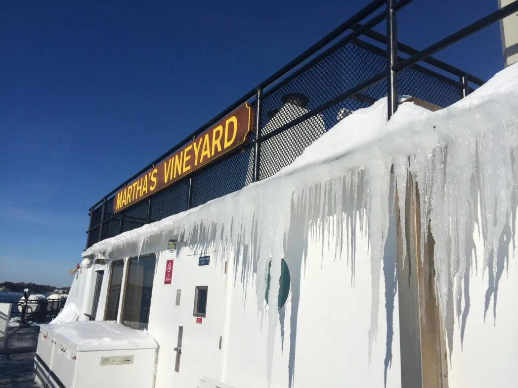 Icicles hanging from the Martha's Vineyard ferry terminal sign in winter