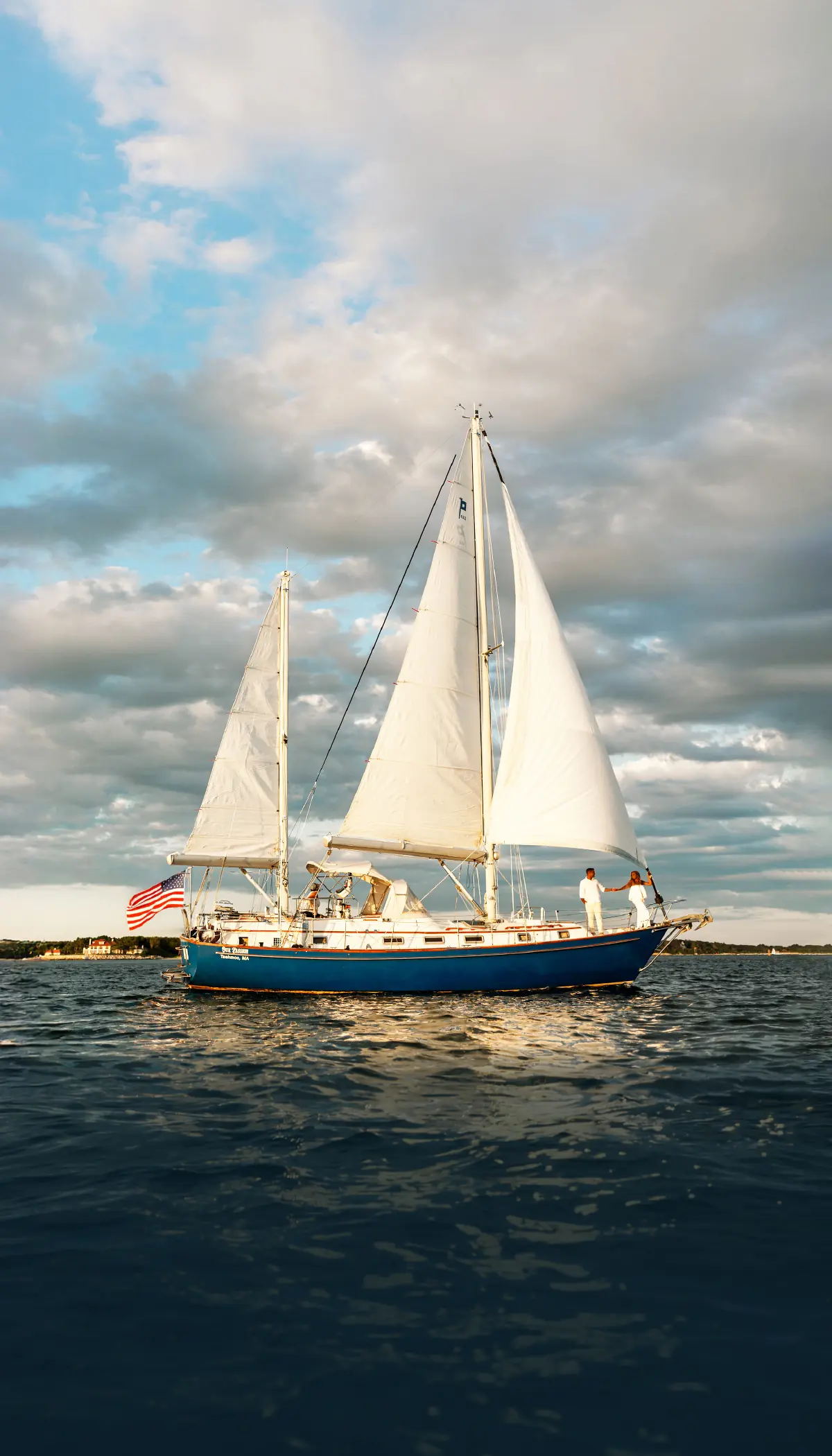 Our Passion, a 42-foot Pearson ketch, under full sail off Martha’s Vineyard at golden hour